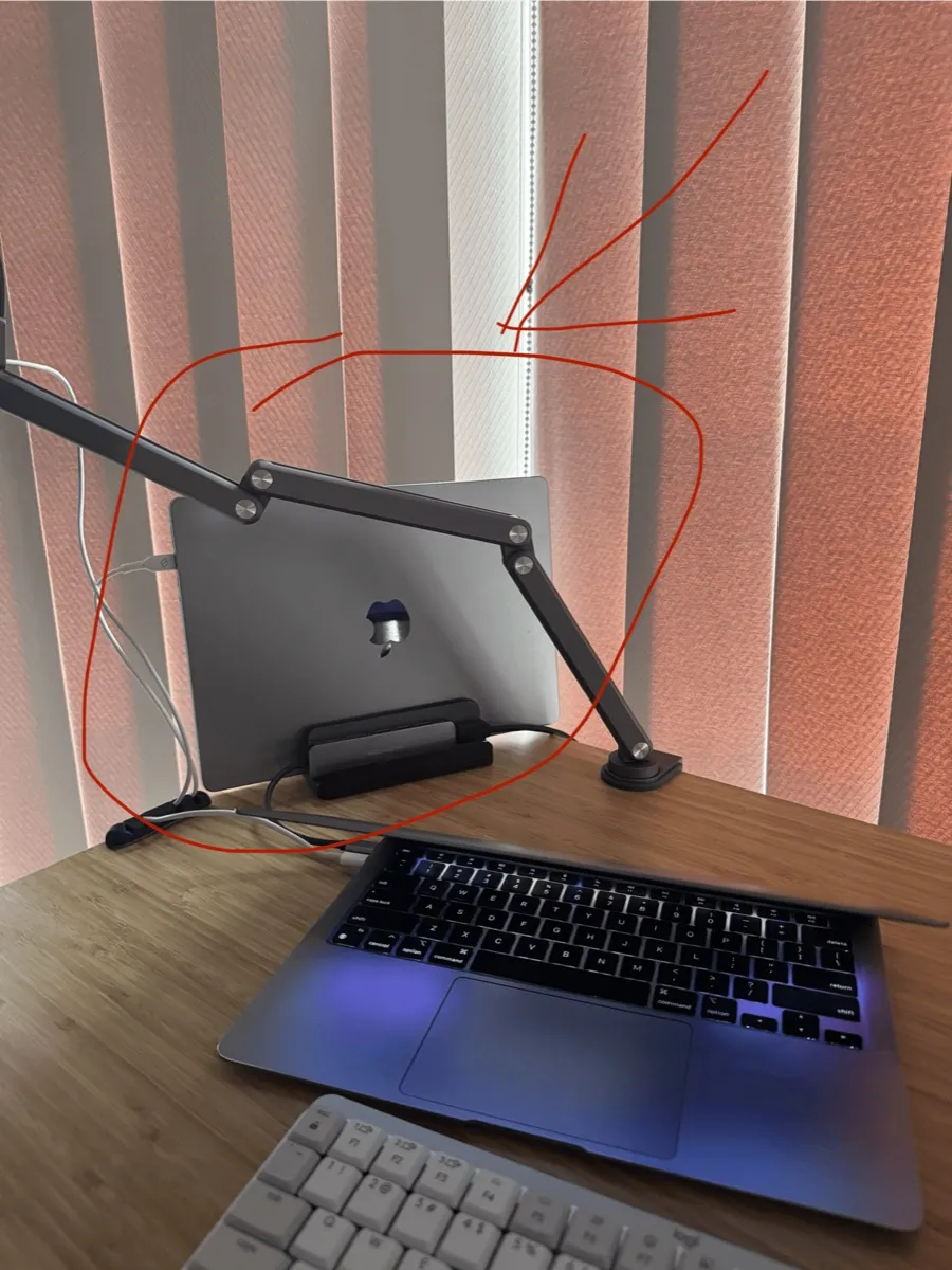 A spare laptop running OpenClaw as a 24-7 AI agent setup on a desk